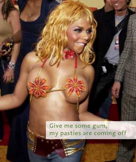 Little kim with a daisy bra on that reveals her breasts with the caption give me some gum my pasties are coming off