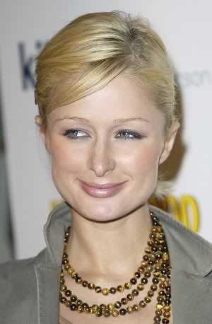 Paris Hilton's face looking squinty