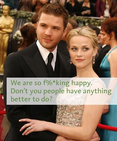 Reese and Ryan posing while hugging at the Oscars. Caption reads: we are so f**cking happy. Don't you people have anything better to do?