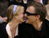 Heath Ledger and Michelle Williams at a Lakers Game