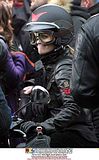 Reese Witherspoon in a helmet and big googles for a role