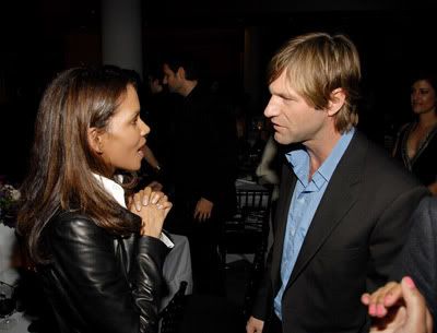 Halle Berry and Aaron Eckhart talking to each other at the Say Something after party