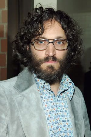 Vincent Gallo with ugly big glasses and a full shaggy beard