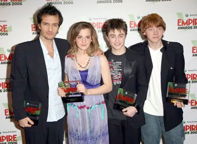 Stars of Harry Potter at the Empire Film Awards holding their award
