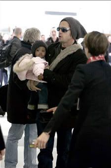 Angelina Jolie and Brad Pitt at the airport