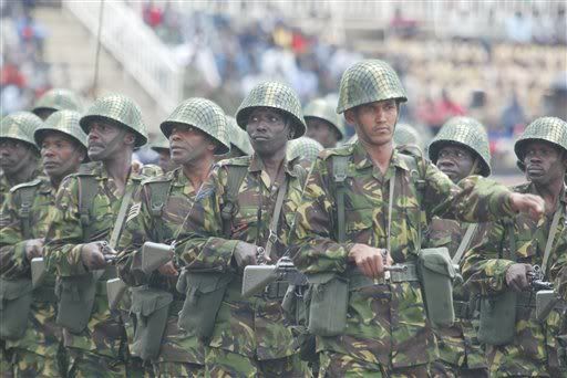 The Kenya Army soldiers from 75 Artillery Battalion in combat dress march at