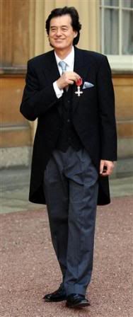 jp all dressed up and honoured with an OBE from the Queen