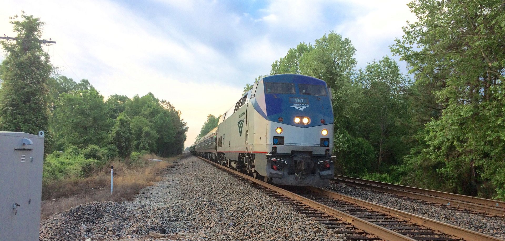 Apparently, about the time I was supposed to be shipping books, I was hanging out on Route 460 in Zuni, watching trains go by. This Amtrak was moving at 70+mph and I was amazed that this cell-phone photo came out as good as it did!