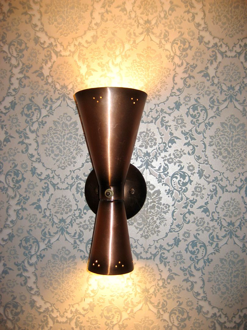 The electrician had a young helper named Tommy. When Tommy first saw the sconces, he said, Wow, theyre like antiques! And I said, Well, not really. Theyre from the late 1950s, and he said, Wow, they really are antiques! I took umbrage at that. I almost found myself saying, Young man, that means that *I* am an antique!!