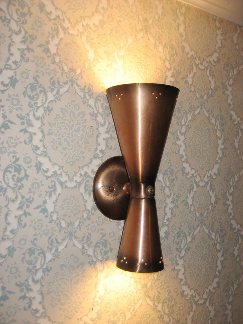 And I love the fact that they cast light in two directions. Very practical.