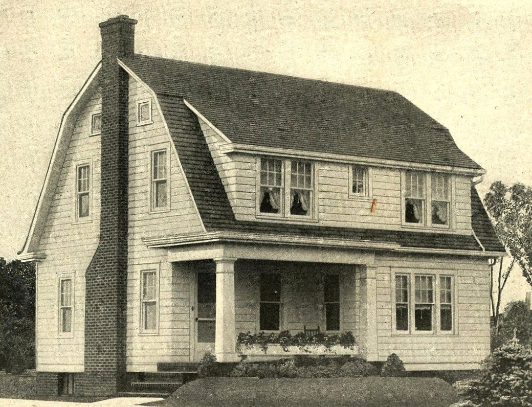 I sure do love a nice Dutch Colonial, and this one has a front porch!