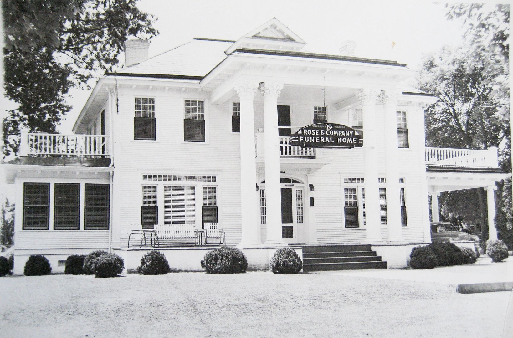 This Magnolia is in Benson, NC and the photo dates back to the late 1940s. This house has been in use as a funeral home for many decades. 