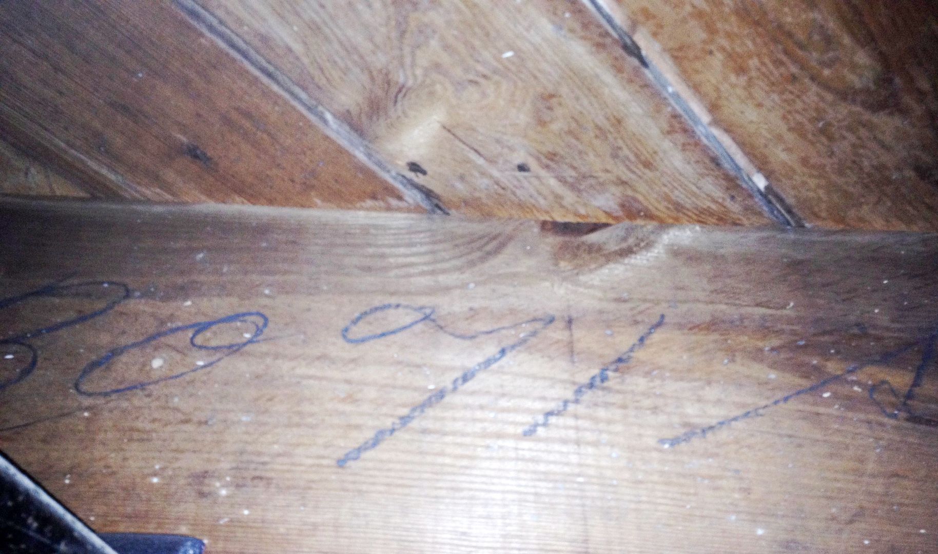 And in the basement, Catarina found the model number written on the floor joists!