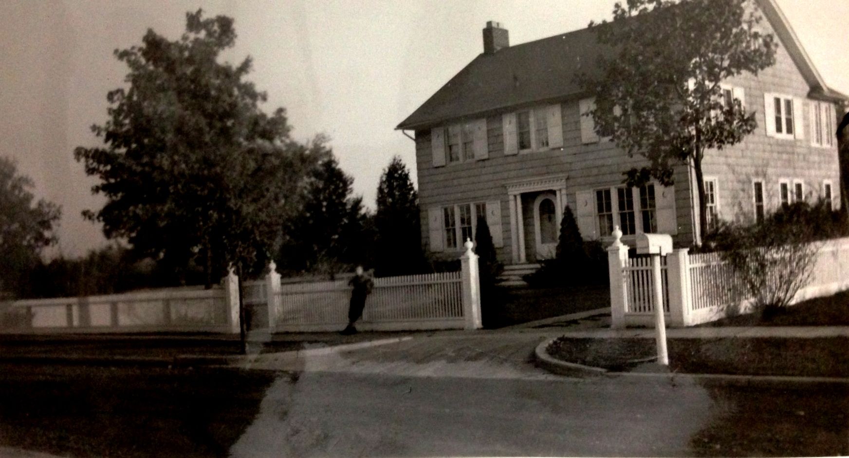 And a wonderful photo showing a picture-perfect picket fence.