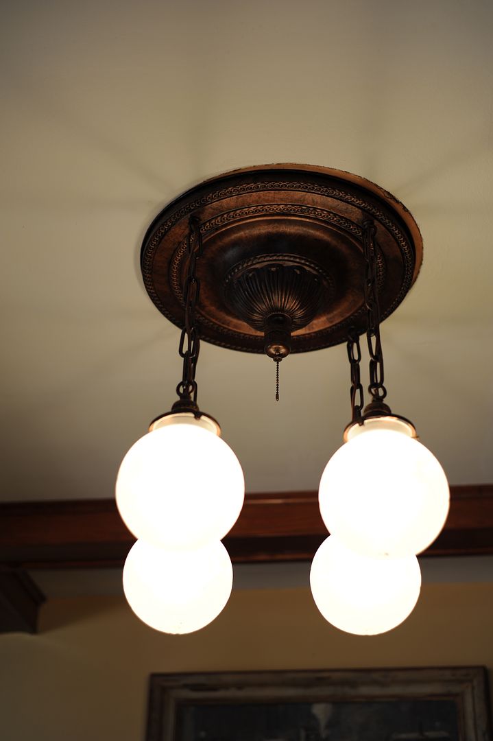 Throughout the house, its originality shines through. A few of the original light fixtures are still in place. 