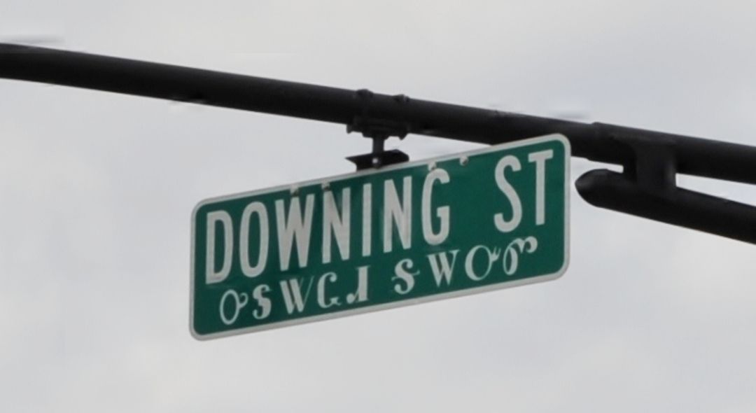 Street signs are printed in both English and in Cherokee language.