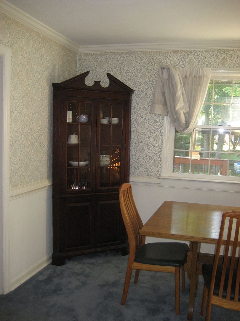 My mothers china hutch looks right at home in the corner of our dining room. 