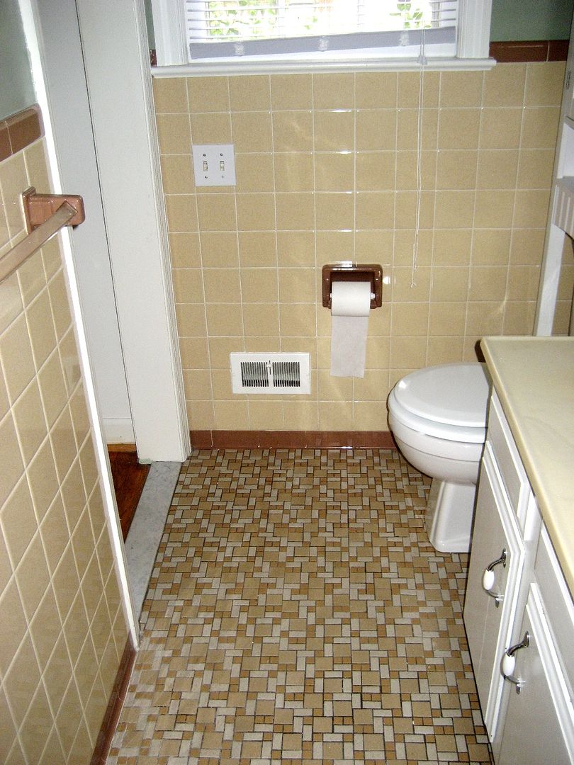 I firmly believe the key to marital bliss is his and her bathrooms. This bathroom - with its tan and brown colors - is HIS bathroom. It also has an unusually spacious shower. 