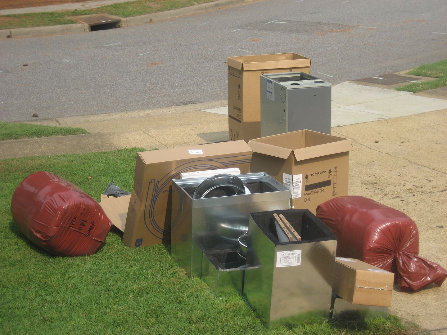 The new stuff waits patiently on the curb.