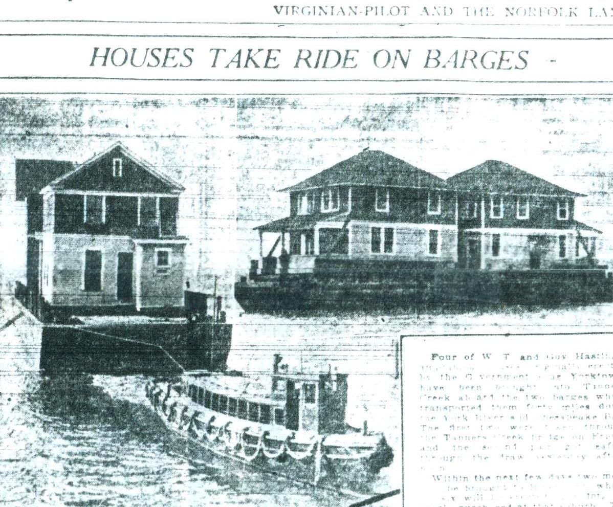 Photo from 1921 shows the houses being transported by barge down the Lafayette River. 