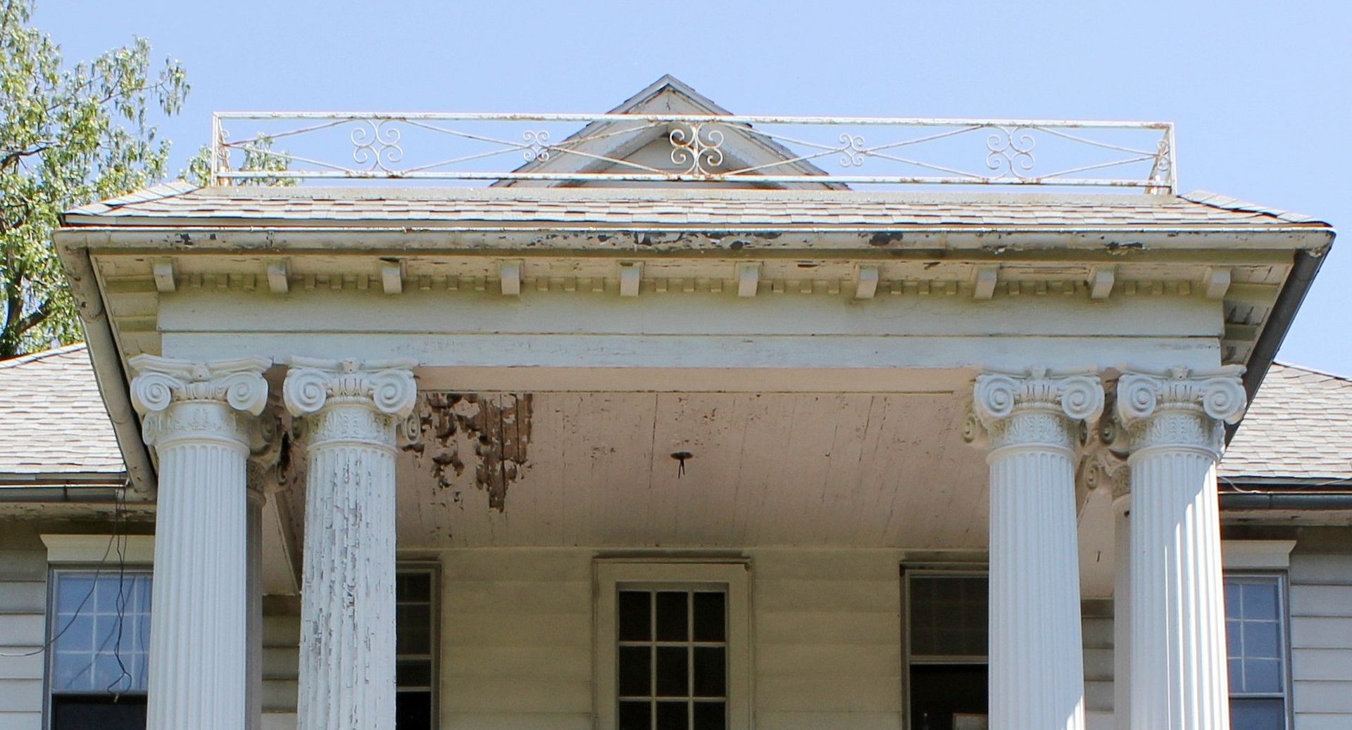 The porch ceiling needs a little attention, too.