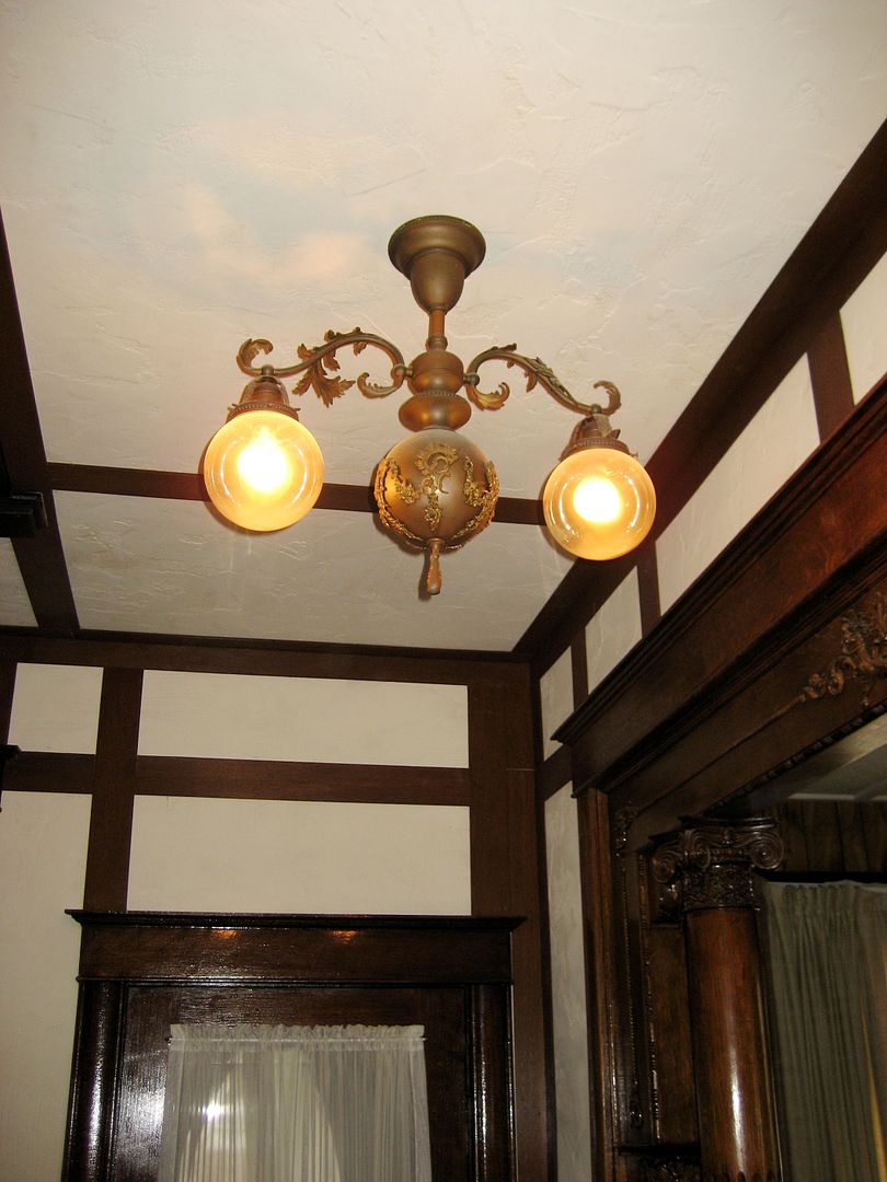 The foyer also has an original light fixture.