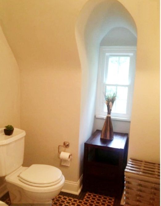 There is something charming about a bathroom tucked under a dormer.