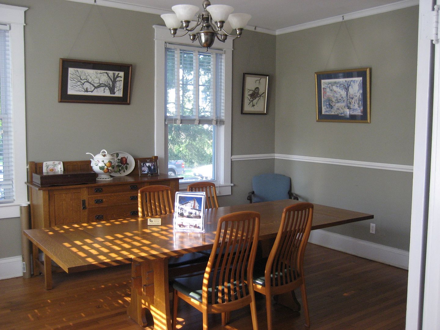 The setting sun illuminates the formal dining room, which measures more than 13 x 17. 