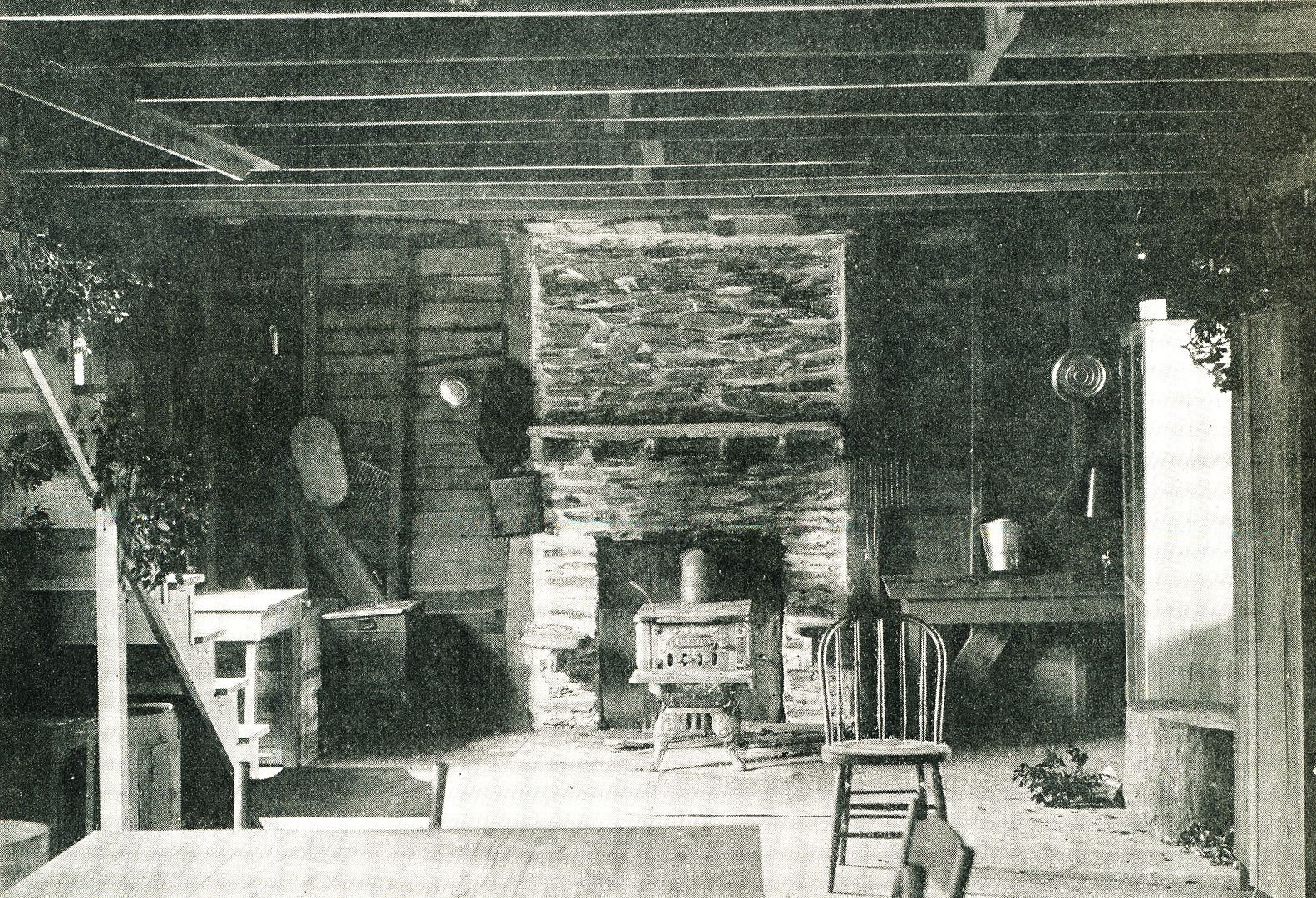 Interior of the retreat. Note the wood-burning stove.