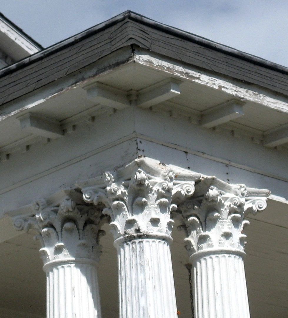 Close up of Corinthian columns on Sears Magnolia in Alabama