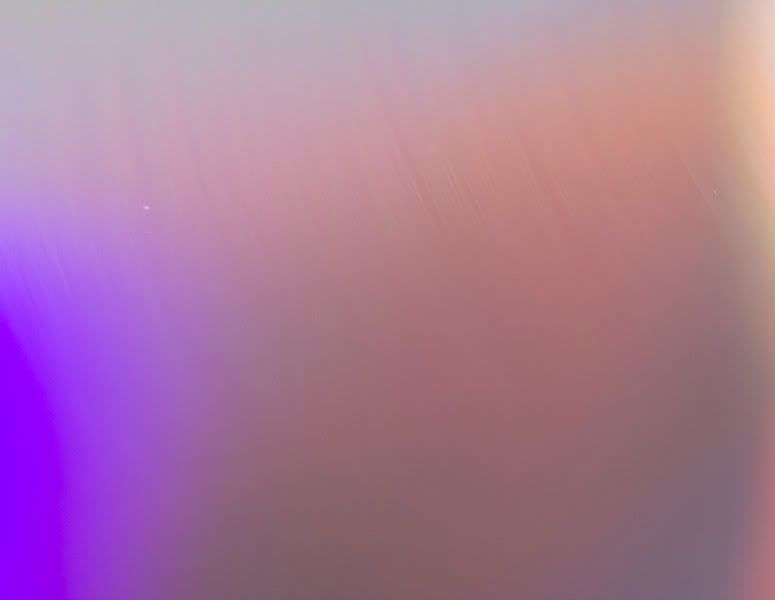 IMAGE: http://img.photobucket.com/albums/v109/angryhampster/artistic/disc2.jpg