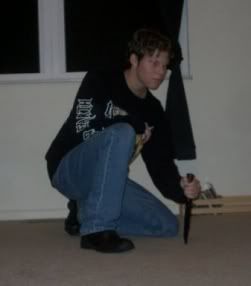 <img:http://img.photobucket.com/albums/v11/Draco911/crouchingwithknifesm21.jpg>