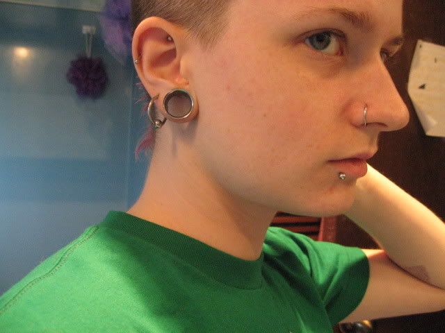 This one you can see my nostril piercing and snakebites, and this is closer 