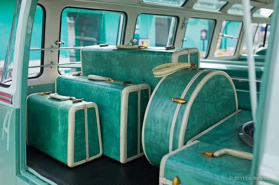 vintage blue luggage in voltswagen bus