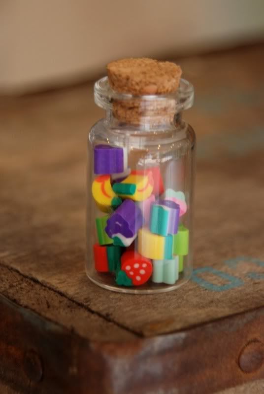 the yellow brick road glass bottle of mini erasers