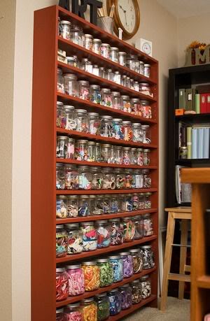 mason jars filled with buttons and ribbon storage