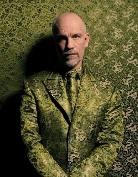 john malkovich in green suit