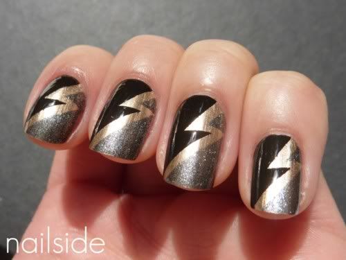 black gold and silver lightening bolt nails
