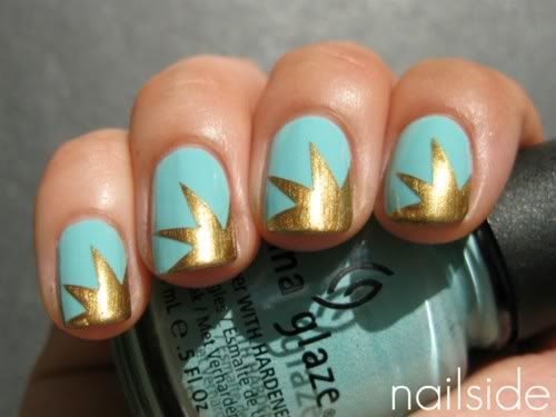light blue and gold star nails