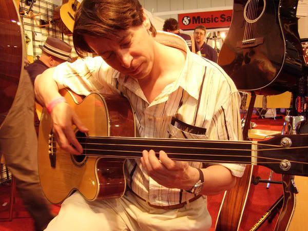 Paul plays the Ashbury acoustic fretless bass