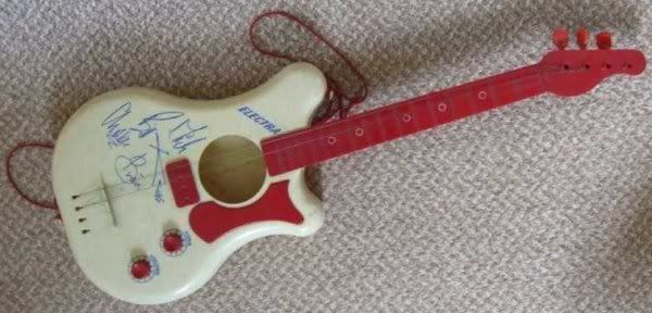 Selcol Rolling Stones plastic toy guitar