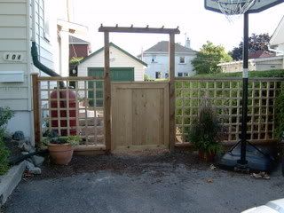 fence at righthand side of house