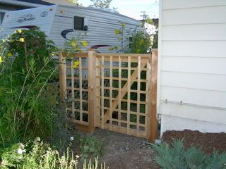 fence at lefthand side of the house