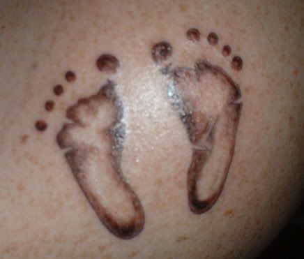 baby footprint tattoos. Took it to the tattoo guy,