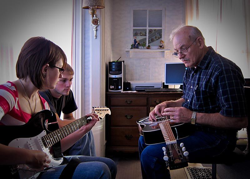 IMAGE: http://img.photobucket.com/albums/v130/GaryWGraley/S90/Misc/caitlin_grandpa.jpg