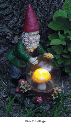 Garden gnome with crystal ball