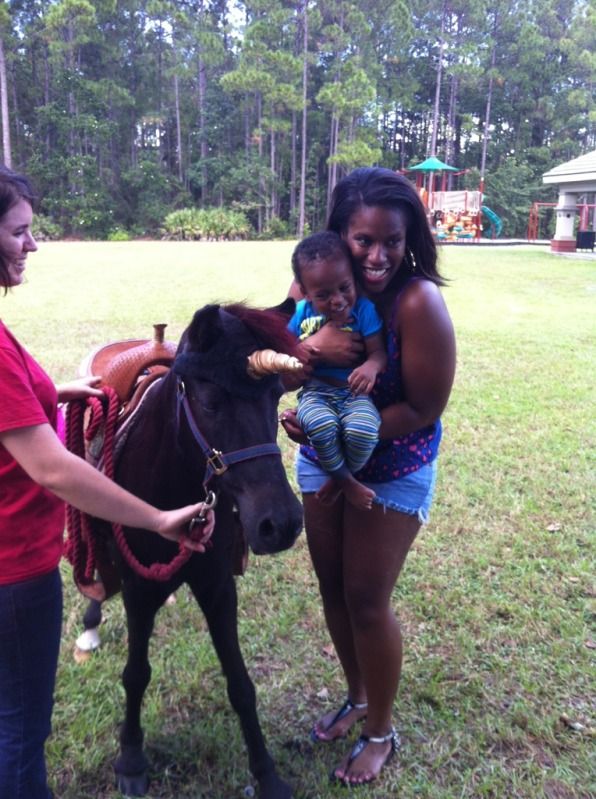 Xavier and his mom meet Magic, our unicorn pony, for his pony rides at his birthday party in Jacksonville, FL