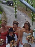 Amanda, her bridesmaids and the ring-bearer taking a horse carriage ride to the wedding ceremony site on their farm in Middleburg, FL.