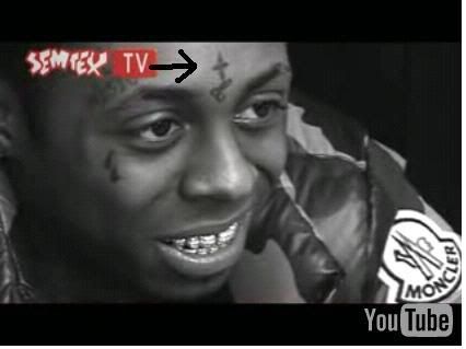 lil wayne new tattoos. Lil Wayne new tattoo on face