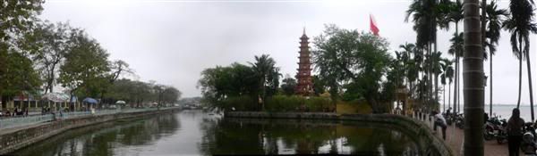 In the pagoda, there are many valuable statues, such as the red lac­statue trimmed with gold of Sakyamouni Buddha's Parinirvana and many ancient stele, with the old- one made in 1639 by Doctoral lau- Nguyen Xuan Chinh recording the Pagoda's history. In 1959, on his visit to Vietnam, Indian Prime Minister Razendia Prasat offered the Pagoda a bodhi tree as a gift. The plant was grafted from the holy bodhi tree where Sakyamuni sat in zen (meditation) position 25 centuries ago. Now the bodhi tree is green and luxuriant, shading part of the pagoda's yard. As a religious relic among spectac­scenery, Tran Quoc Pagoda is a favourite stop-over of many foreign visitors and pilgrims.